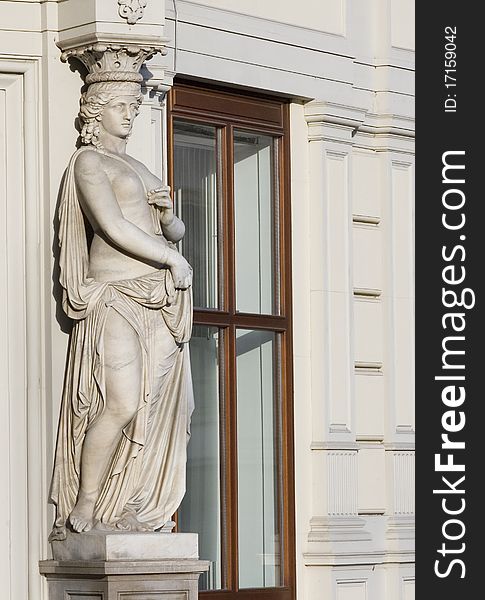 Statue of a woman by a window in Vienna. Statue of a woman by a window in Vienna