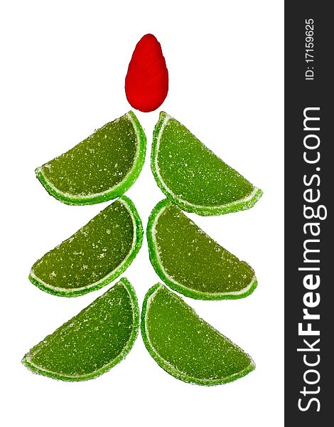 Christmas fur-tree from segments of green fruit candy. Christmas fur-tree from segments of green fruit candy
