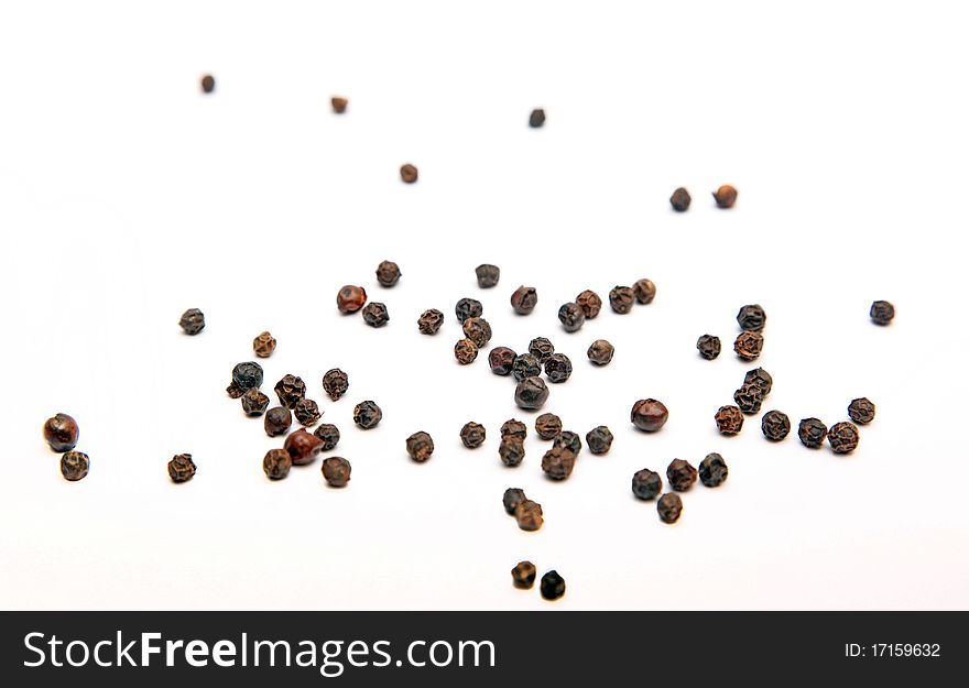 Black pepper isolated on white