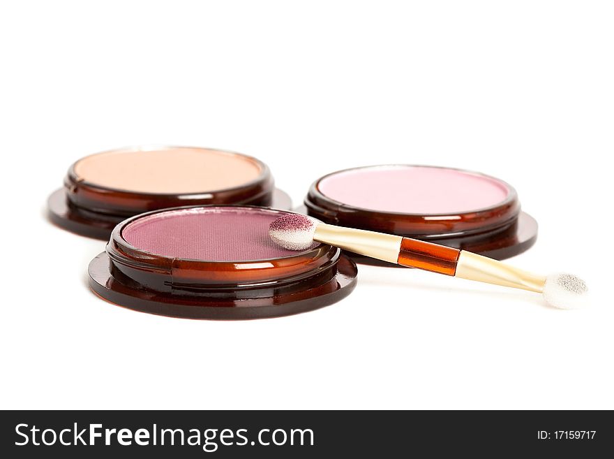 Make-up eyeshadows and cosmetic brush