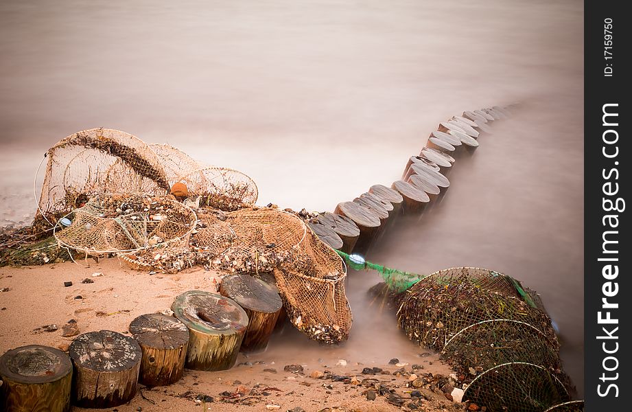 Long time exposure of fishing net stranded on seashore. Long time exposure of fishing net stranded on seashore.