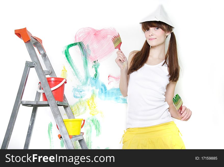 Attractive young girl ready for painting over white