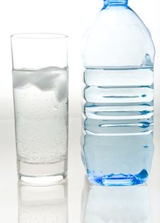 A Bottle Of Fresh Mineral Water And A Glass Royalty Free Stock Photography A Bottle Of Fresh Mineral Water And A Glass Royalty Free Stock Photography