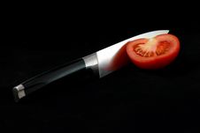 Tomato & Knife Stock Image