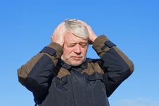 Portrait Of Mature Man On Blue Sky Of Background. Stock Images Portrait Of Mature Man On Blue Sky Of Background. Stock Images