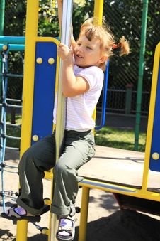 Young Girl On The Playground Stock Images