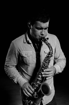 Young Handsome Man Playing Music On Saxophone Stock Images Young Handsome Man Playing Music On Saxophone Stock Images