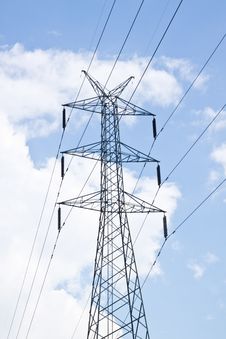 Detail Of Electricity Pylon Against Blue Sky Stock Photos Detail Of Electricity Pylon Against Blue Sky Stock Photos