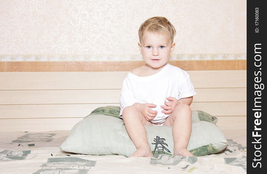 Cute Child On Bed