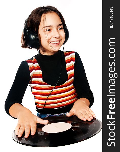 Preschool child with headphones and plate