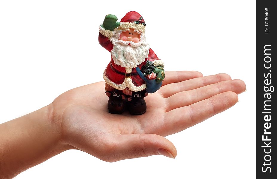 Santa Claus on a hand isolated on a white background
