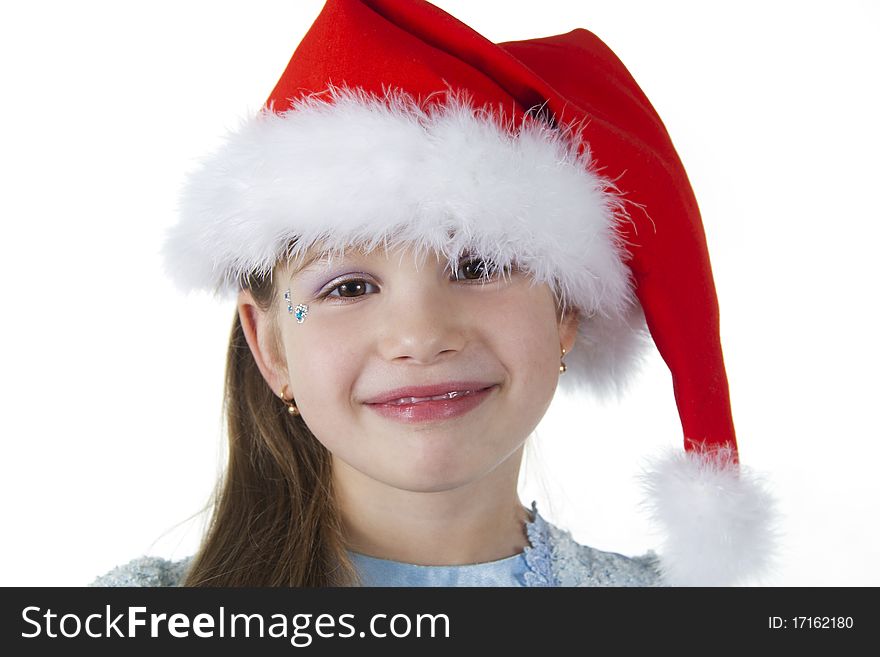 Cute cheerful little girl in a cap of Santy. Cute cheerful little girl in a cap of Santy