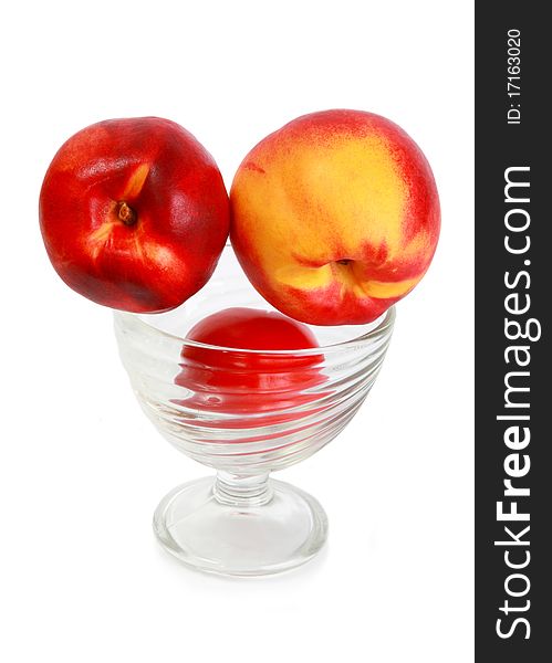 Peaches in a glass bowl