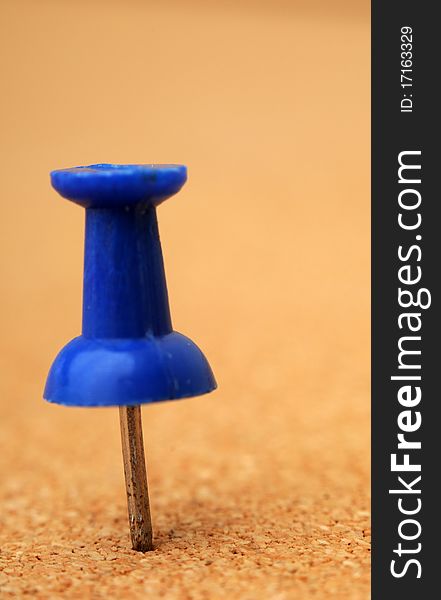 Macro Closeup Of Tack On Corkboard