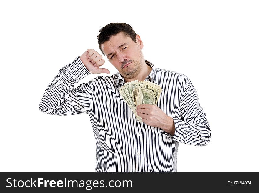 Man with hand full of dollars showing a thumb down, isolated on white background. Man with hand full of dollars showing a thumb down, isolated on white background