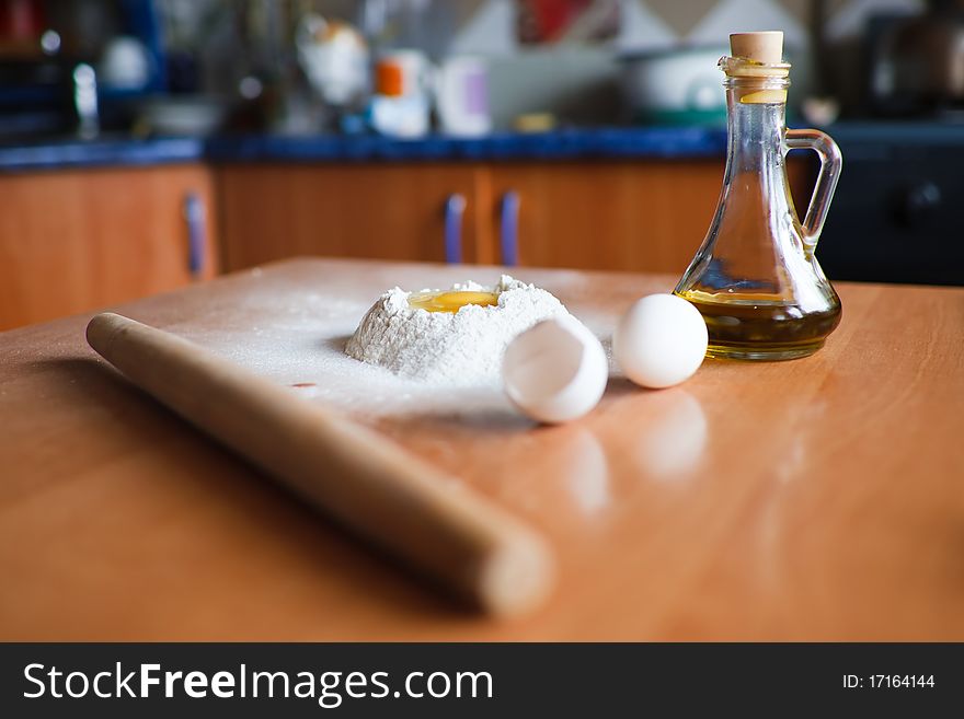 An image of eggs and flour and oil for baking. An image of eggs and flour and oil for baking