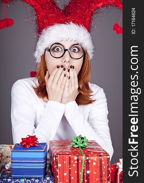 Surprised Red-haired Girl In Christmas Cap