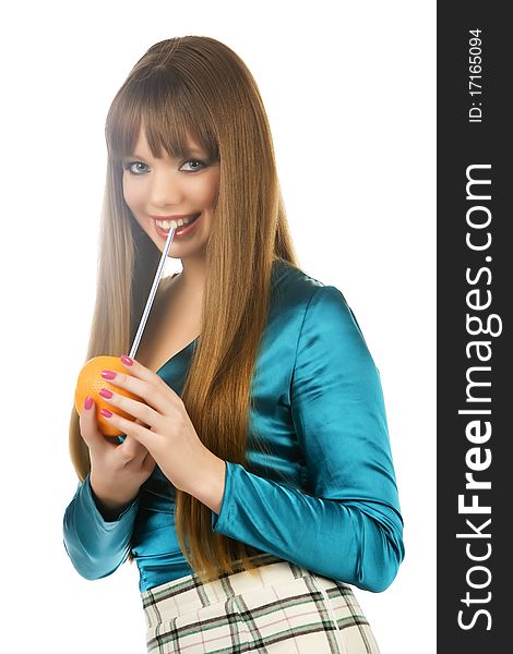 The girl with an orange, a tubule for drink on a white background