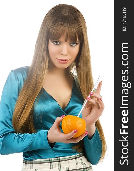 The girl with an orange, a tubule for drink on a white background