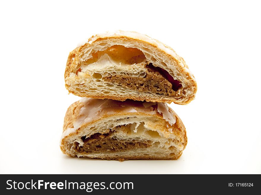 Pastry with nut filling and onto white background