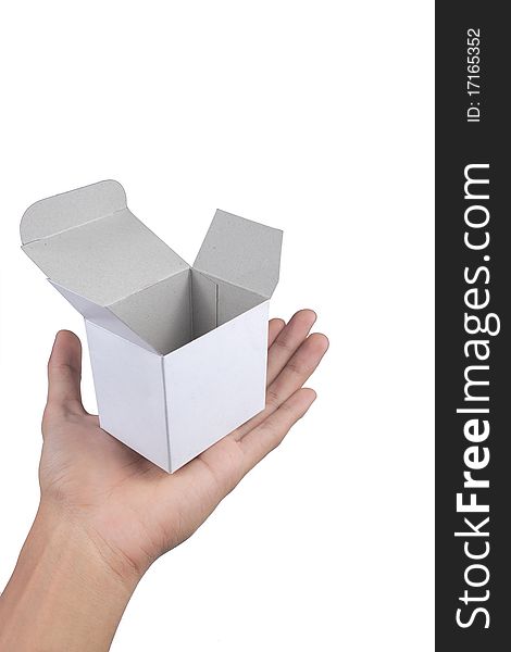 Hand holding white cardboard