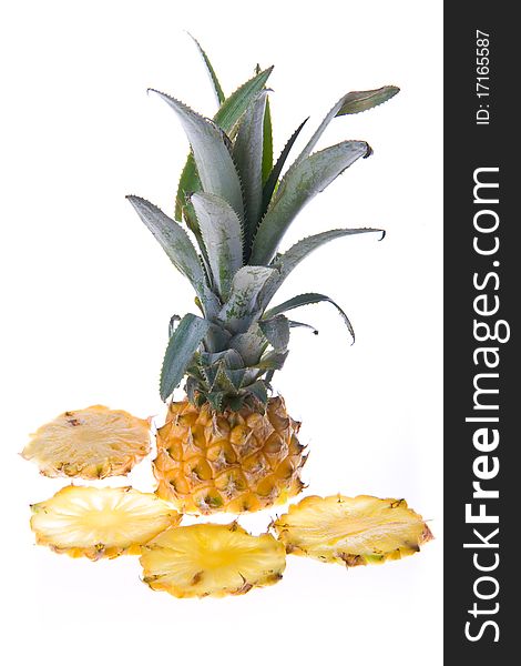 Cut pineapple isolated on white background