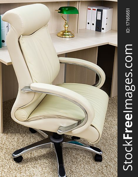 White leather armchair in a modern office