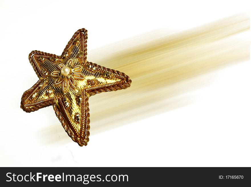 Gold comet star decoration for christmas tree. Gold comet star decoration for christmas tree