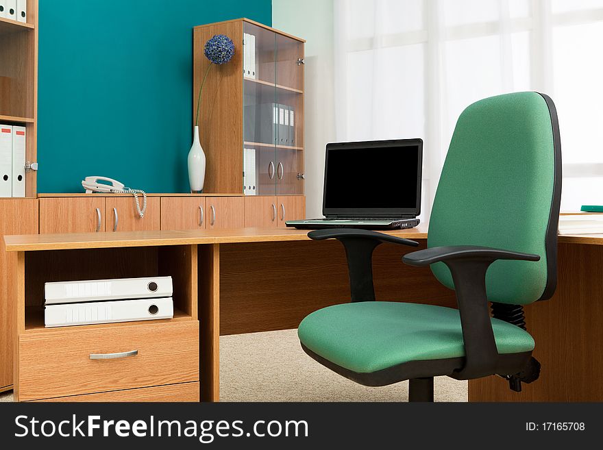 New laptop on a desk at modern office