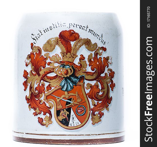 Antique beer tankard with a coat of arms