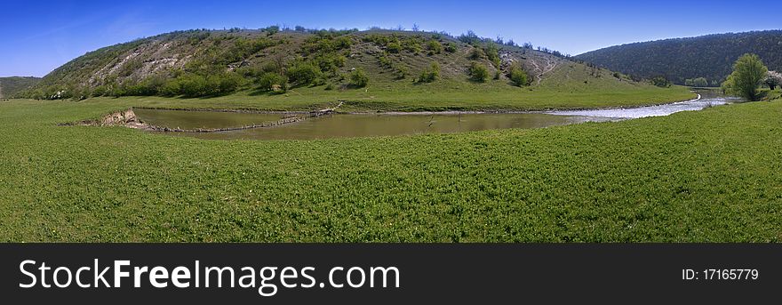 Beautiful panorama of Moldova (Orhei, Furceni) meadow with hills and a river. Beautiful panorama of Moldova (Orhei, Furceni) meadow with hills and a river