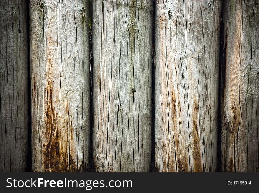 Weathered logs wall wood background