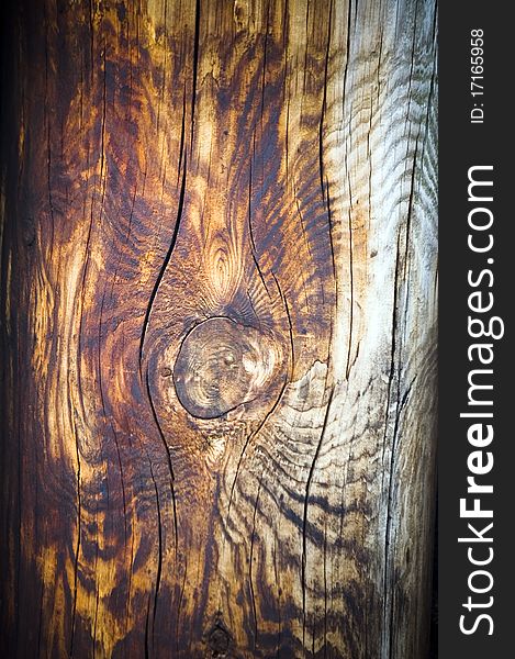 Knots on weathered wood background