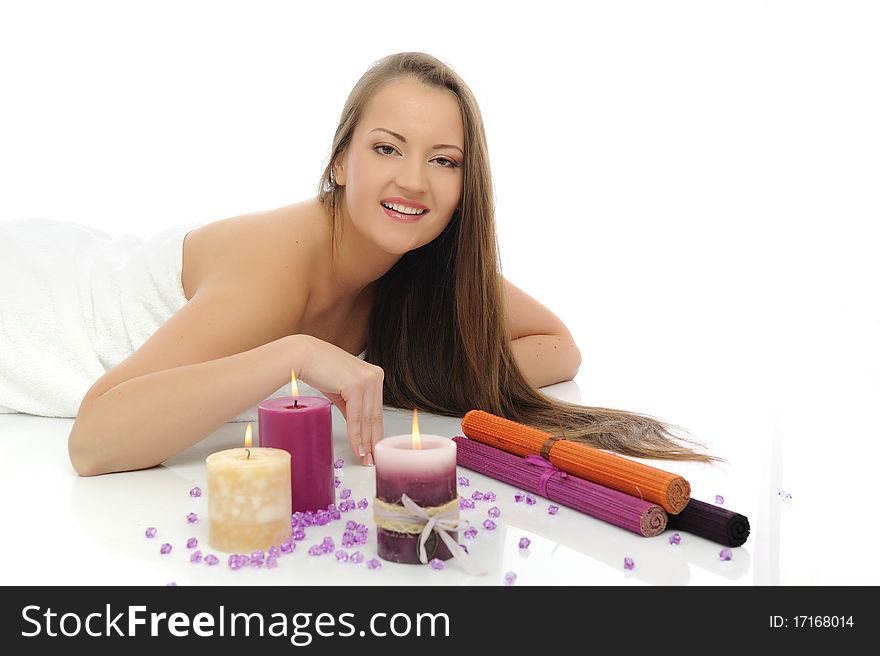 Beautiful woman with pure healthy skin and long hair in spa salon relaxing. isolated on white background. Beautiful woman with pure healthy skin and long hair in spa salon relaxing. isolated on white background