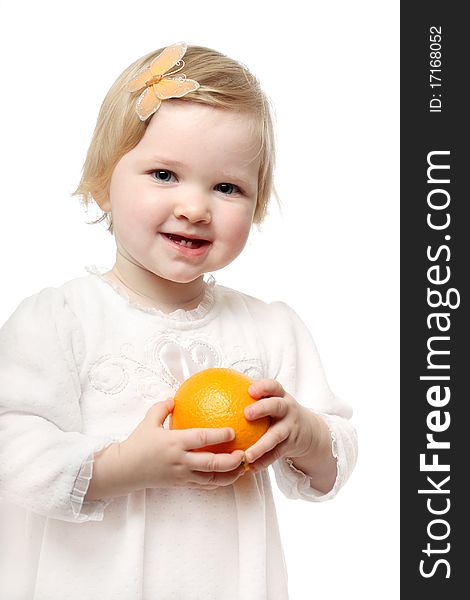 Studio portrait of smiling baby with mellow orange isolated on white. Studio portrait of smiling baby with mellow orange isolated on white.