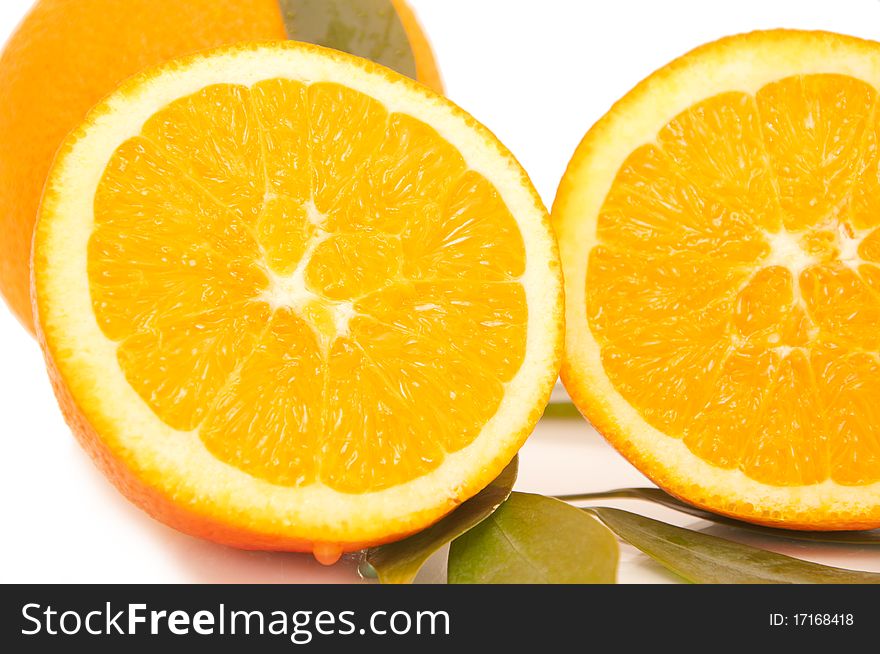 Orange juice and freshly squeezed orange