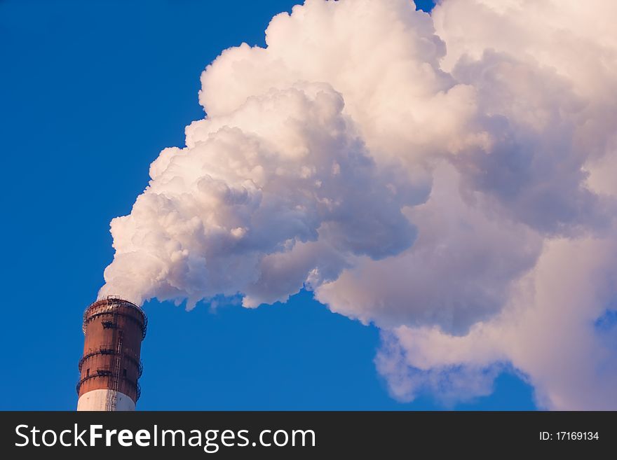 The smoke from the chimney power plant