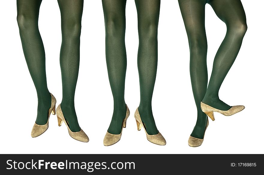 Studio photo of the female legs in colorful tights, legs on the white background.