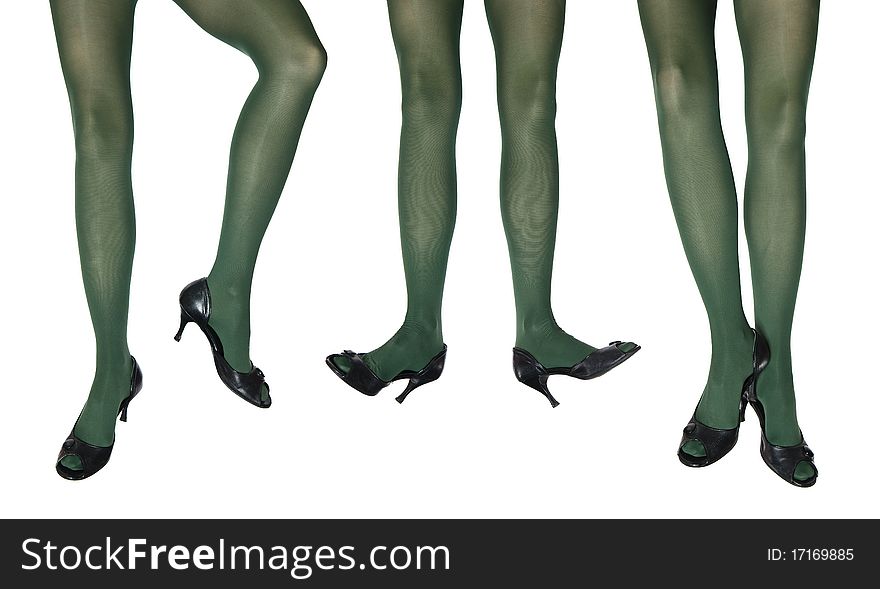 Studio photo of the female legs in colorful tights, legs on the white background.