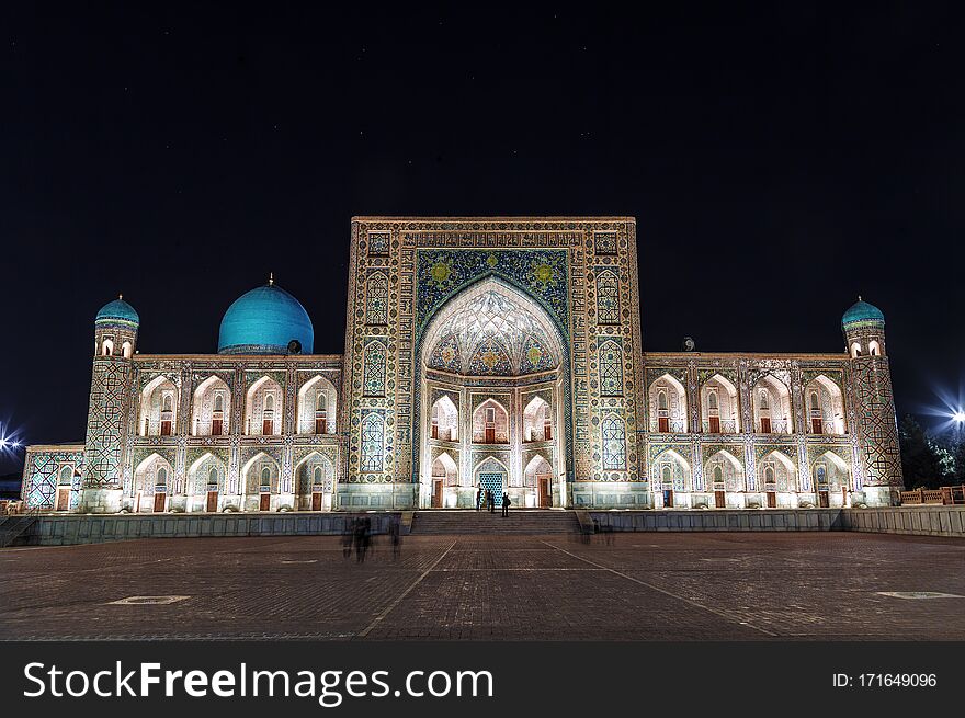 View of Registan square in Samarkand - the main square with Tillya-Kari madrasah at night. Uzbekistan