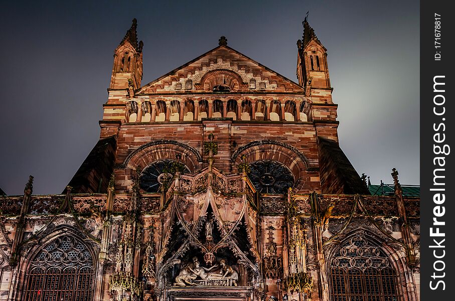 The Side Facade Of The Cathedral In Strasbourg, Richly Decorated With Sculptural Compositions