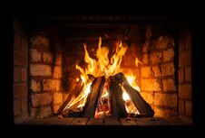 Firewood Burning In A Fireplace Close-up Royalty Free Stock Photos