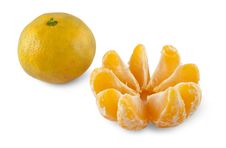 Whole And Peeled Tangerines Royalty Free Stock Images