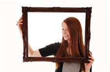 Girl With Picture Frame. Stock Images
