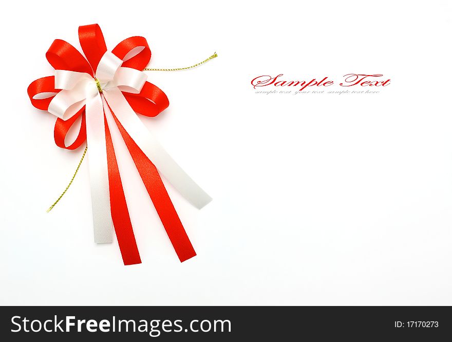 Red and white bow on white background. Red and white bow on white background