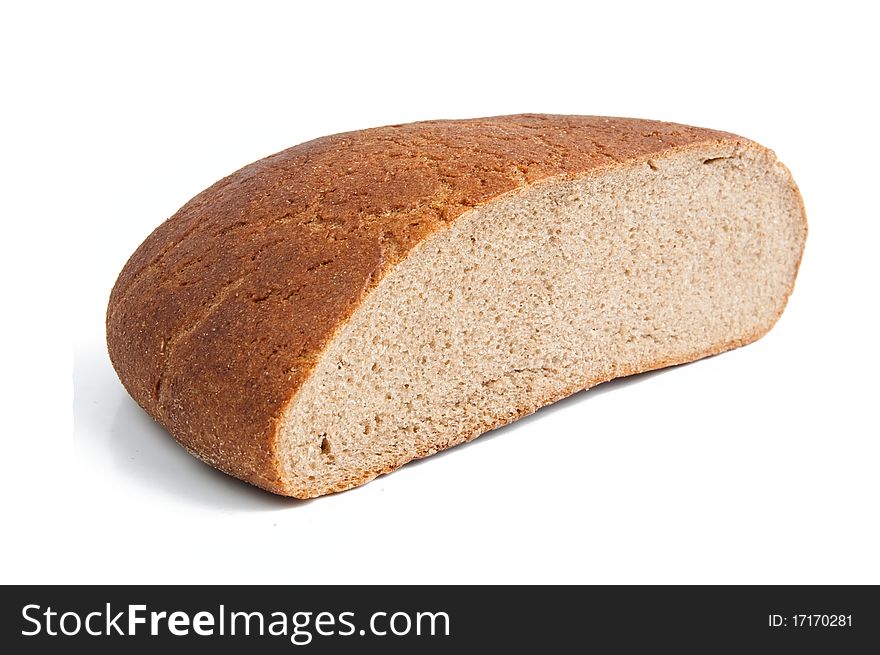 Half of black bread on a white background