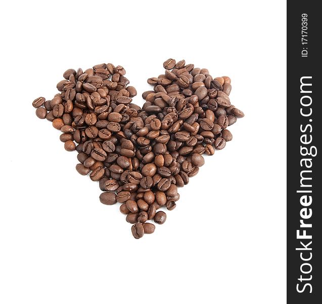 Coffee beans in the shape of a heart on a white