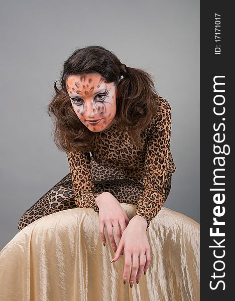 Portrait of girl with leopard's face-art