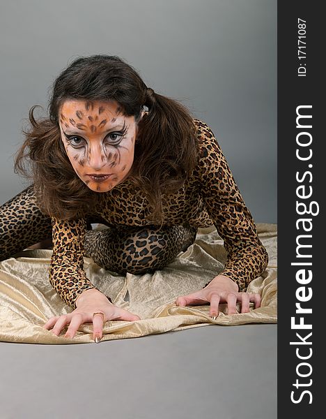 Portrait of girl with leopard s face-art