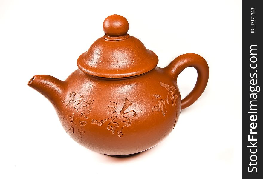 The Chinese ceramic teapot on a white background. The Chinese ceramic teapot on a white background
